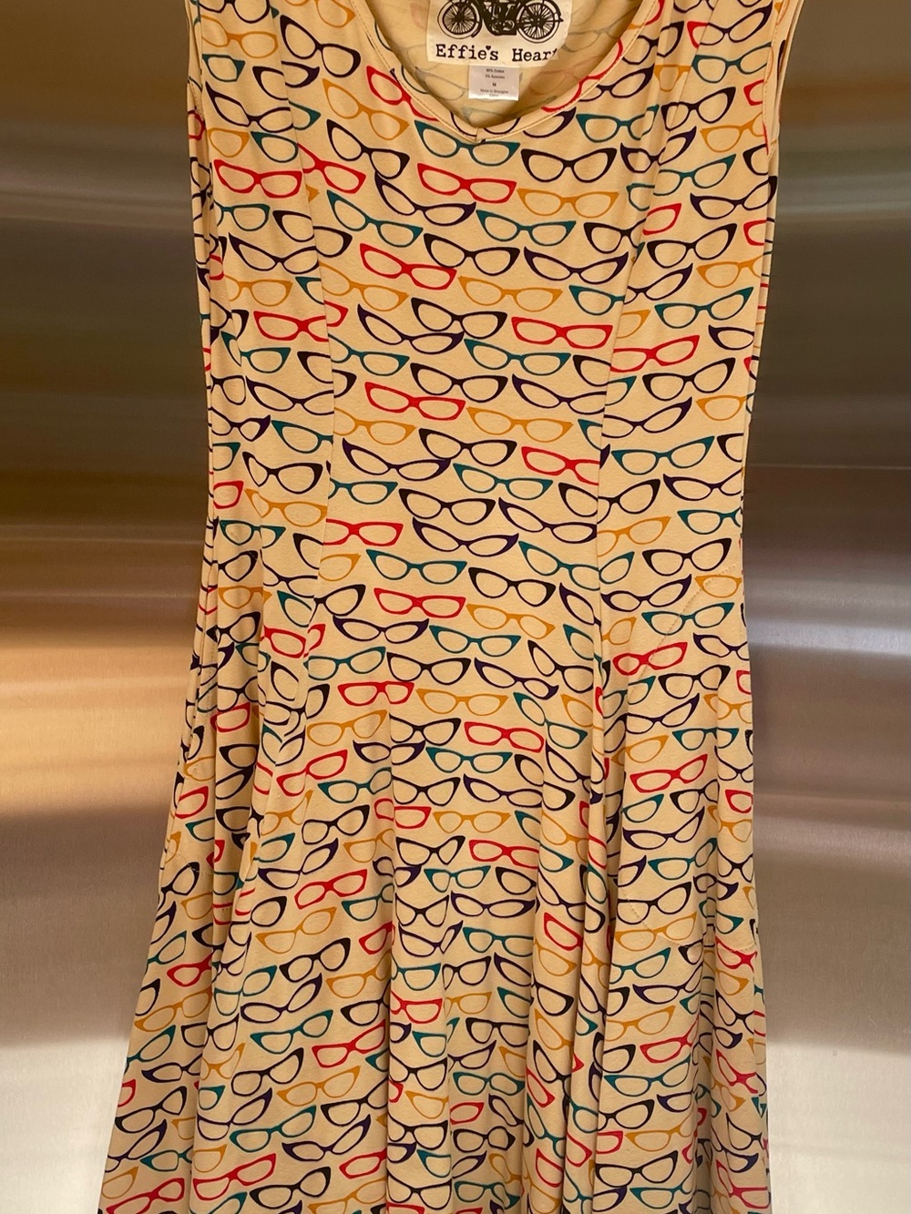 Sleeveless Cream Fit-and-Flare Dress with Multicolor Eyewear Print